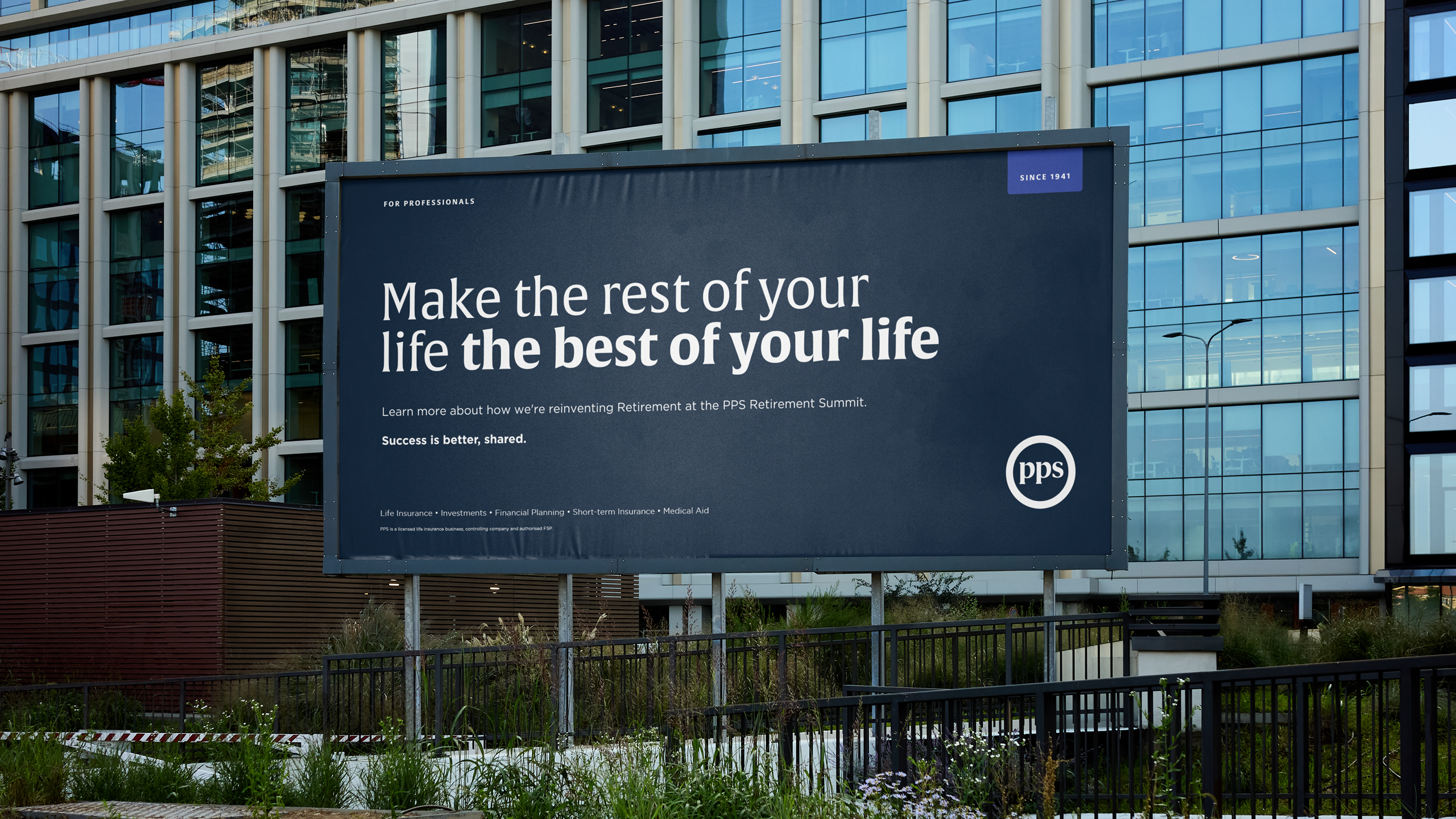 PPS billboard carrying a retirement message above an urban streetscape