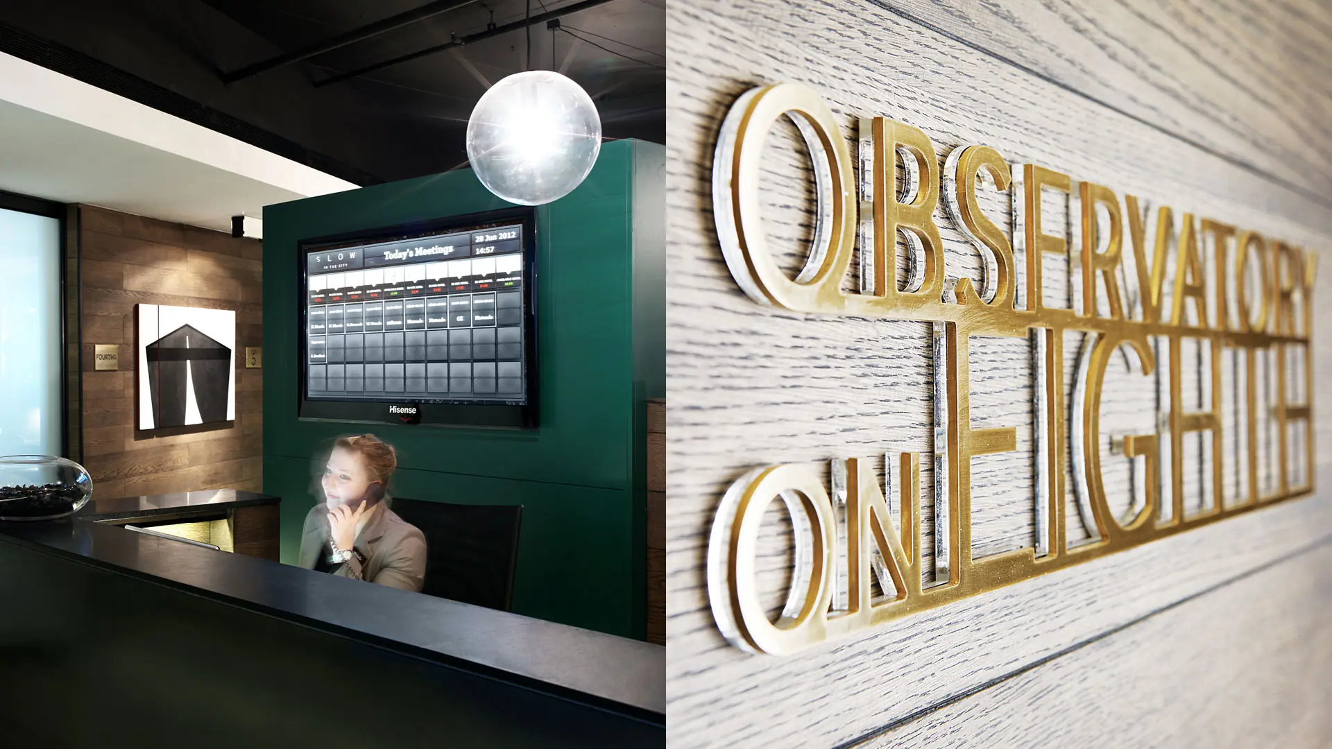 SLOW in the City reception area with a green concierge station and Observatory on Night signage